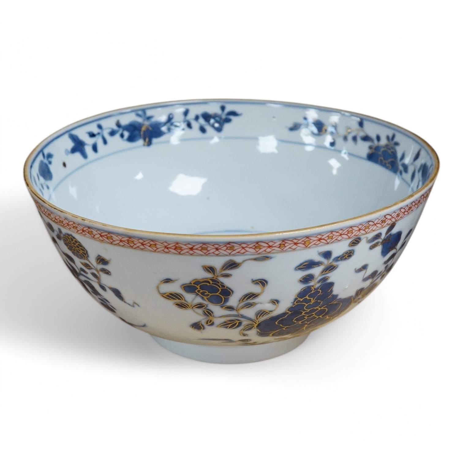 An 18th century Chinese porcelain blue and white bowl with iron red border, 21cm in diameter. Condition - good